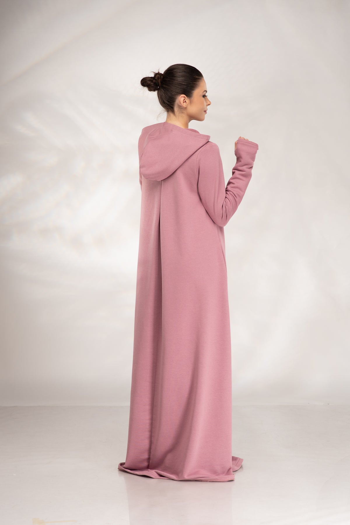 Women’s dusty pink hooded maxi sweatshirt dress, back view showing the floor-length A-line silhouette