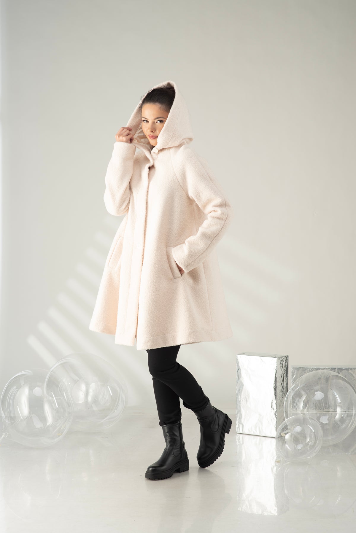 Women's hooded swing coat with oversized hood and button front